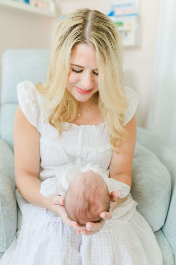 Mom looking at baby during lifestyle newborn session