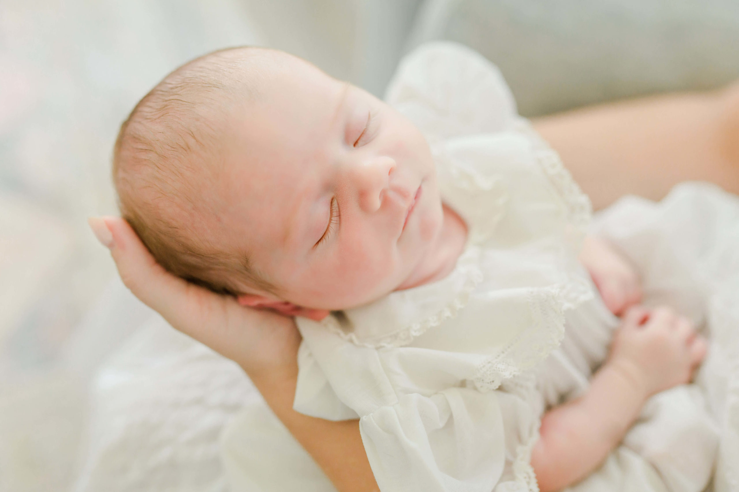 Sleeping baby during lifestyle newborn session