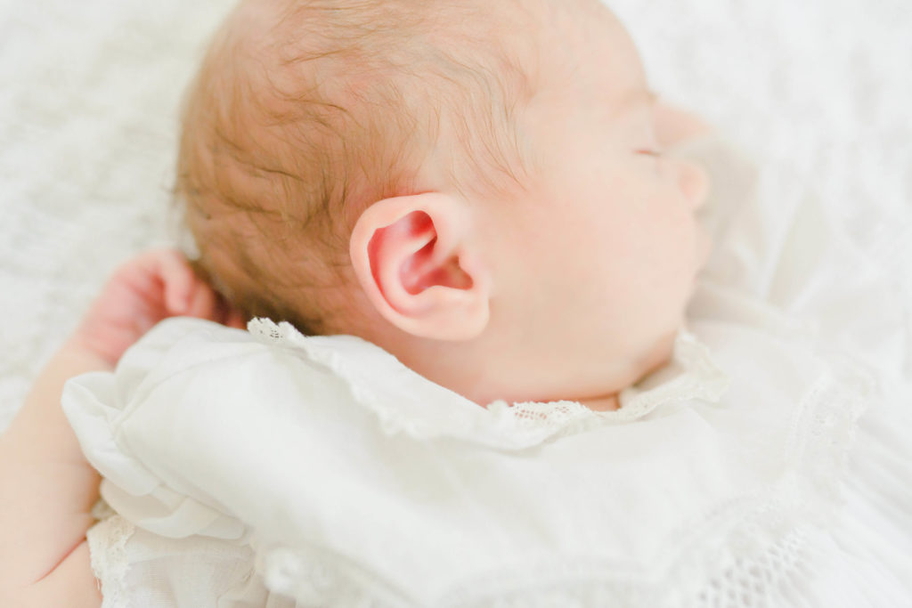 Detail of baby ear during lifestyle newborn session