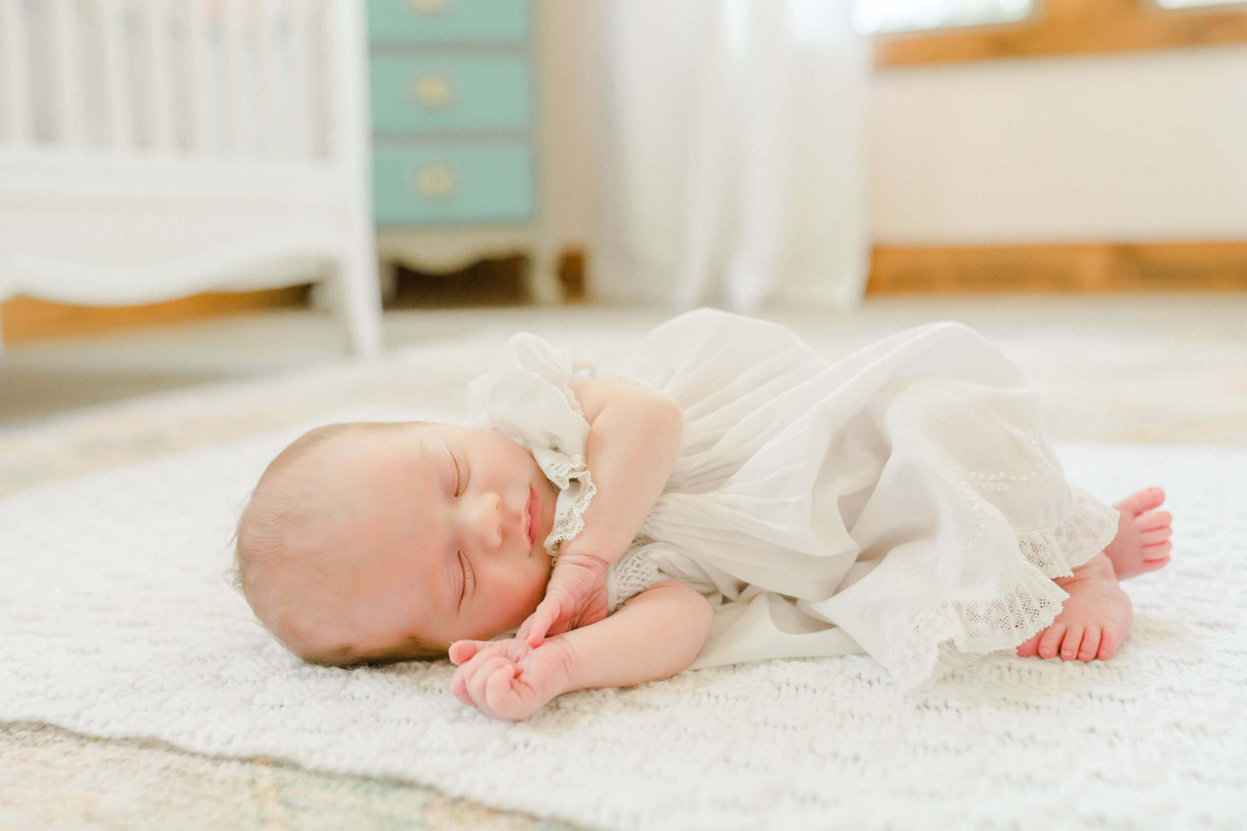 Sleeping baby during lifestyle newborn session