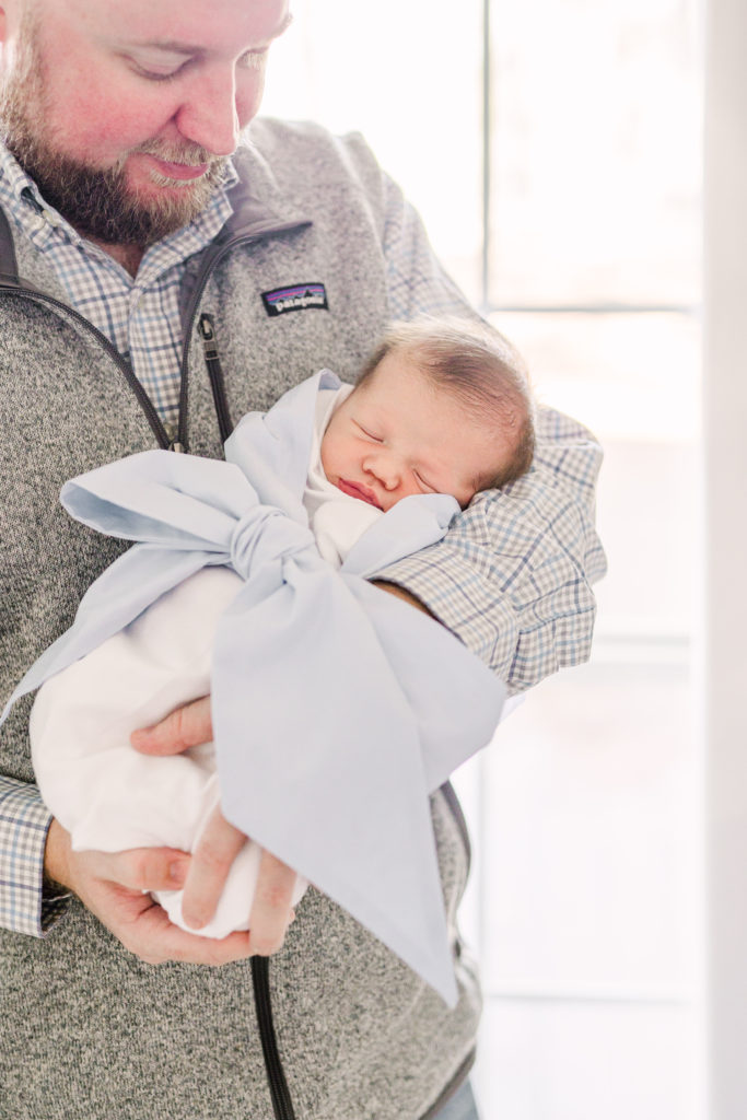 Dad holding baby