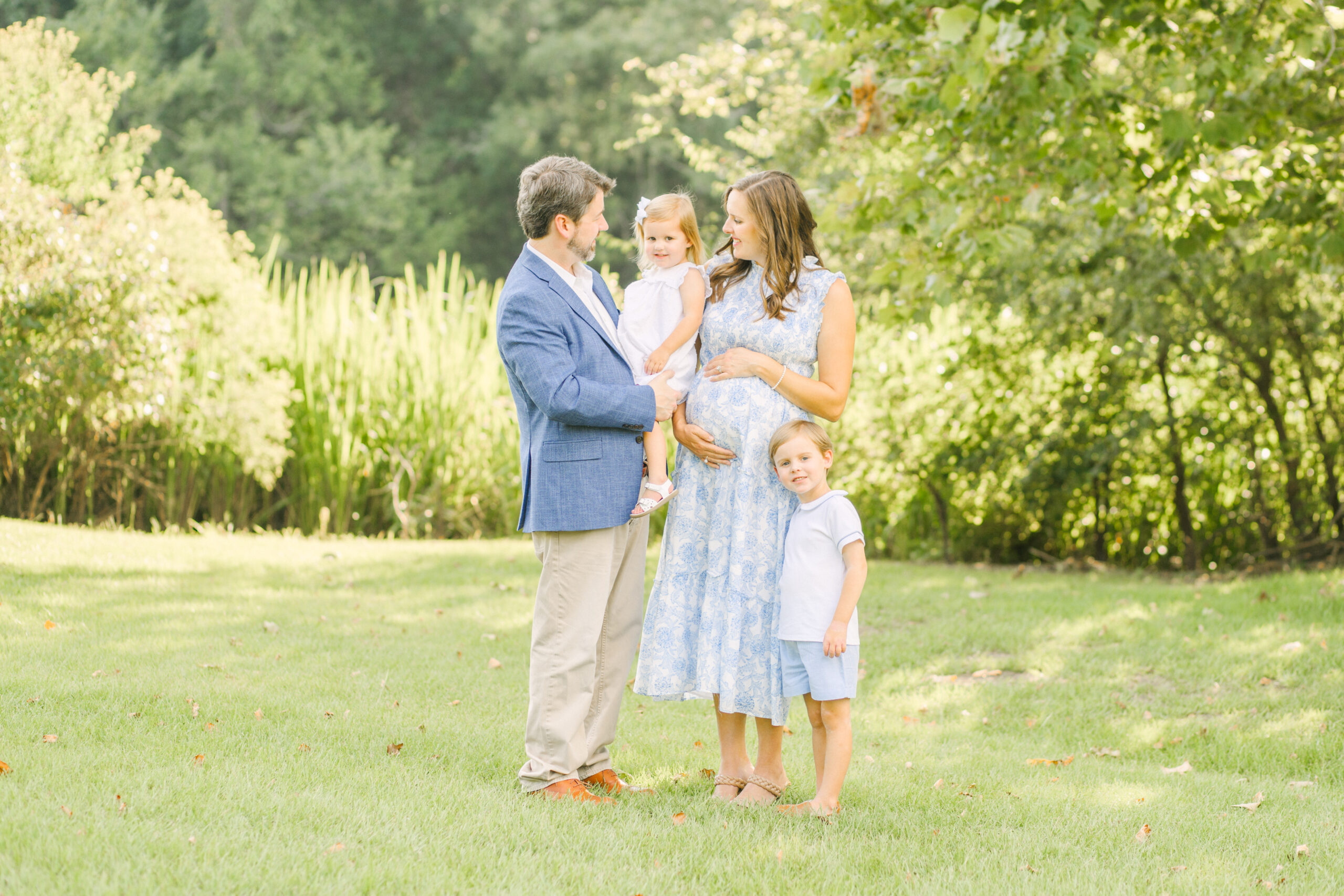 family portrait styling tips with neutral outfits and a pop of navy