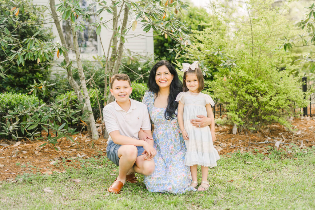 coordinated family outfits for spring photos with soft complementary colors