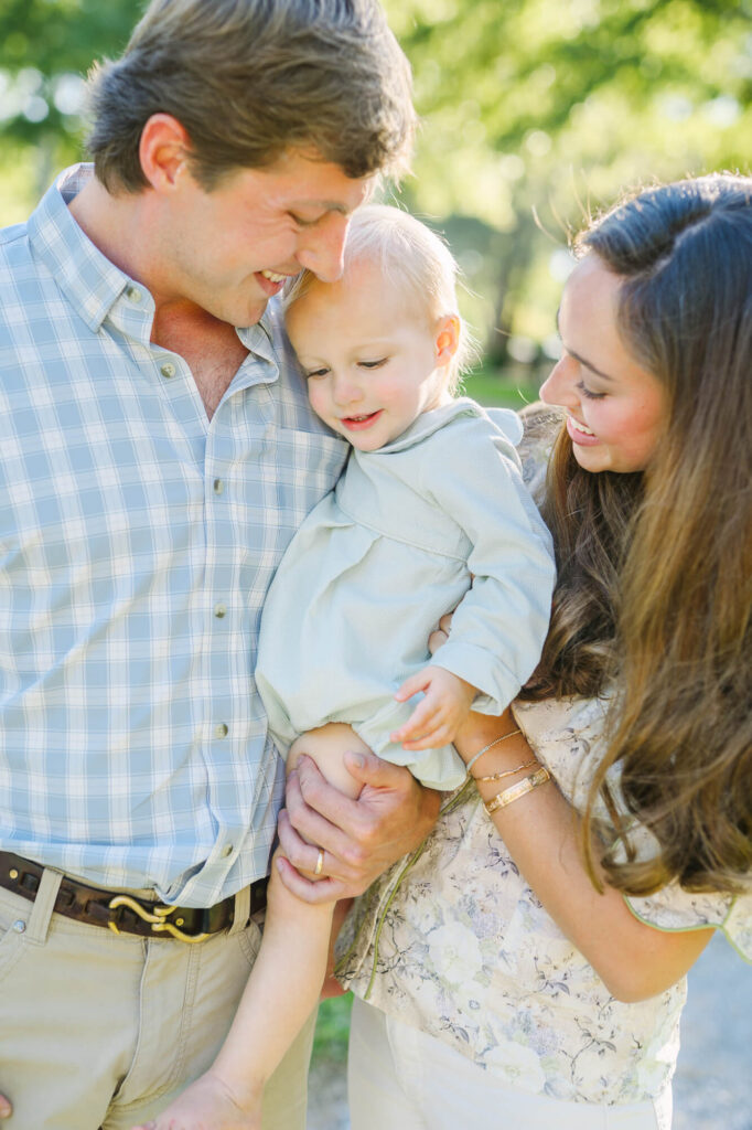 natural light spring family photo session with candid interaction and connection